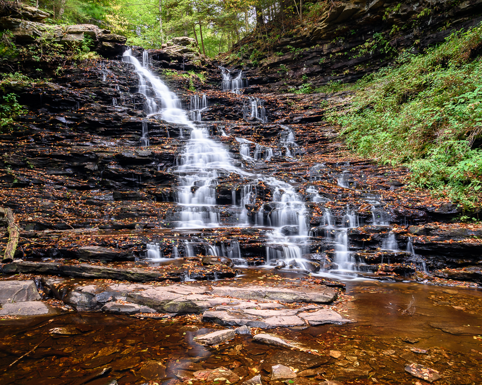 Water cascades down a series of steps.