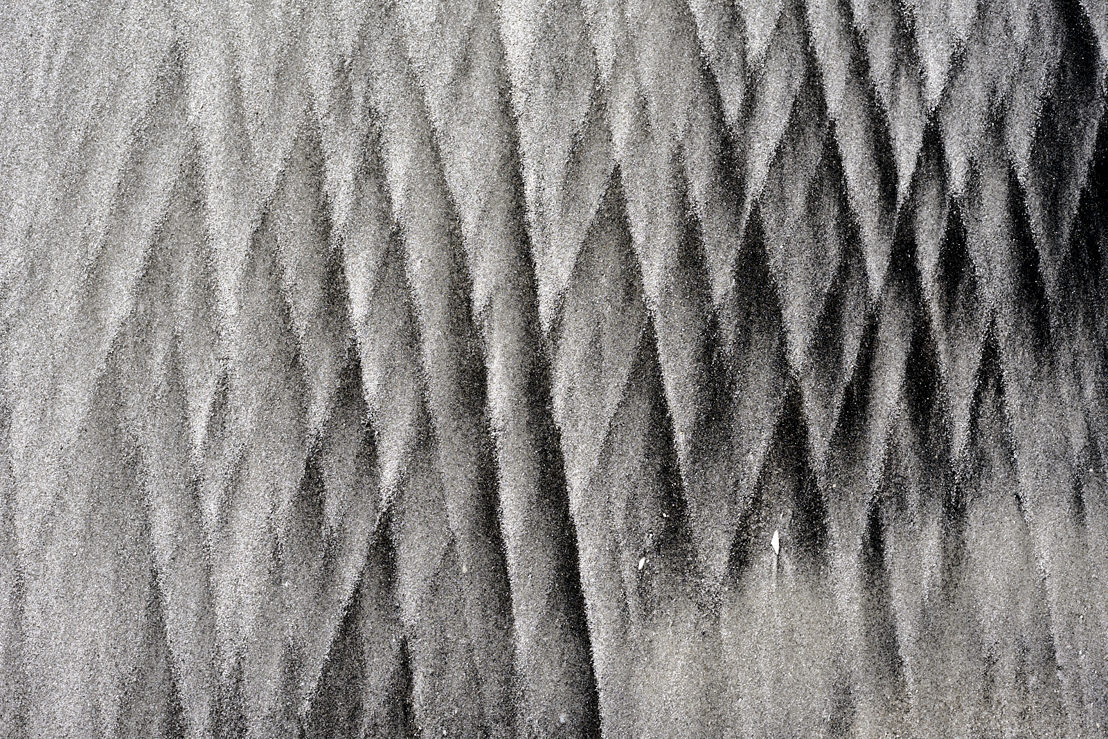 A photo of diamond patterns in the sand along the New Jersey coast.