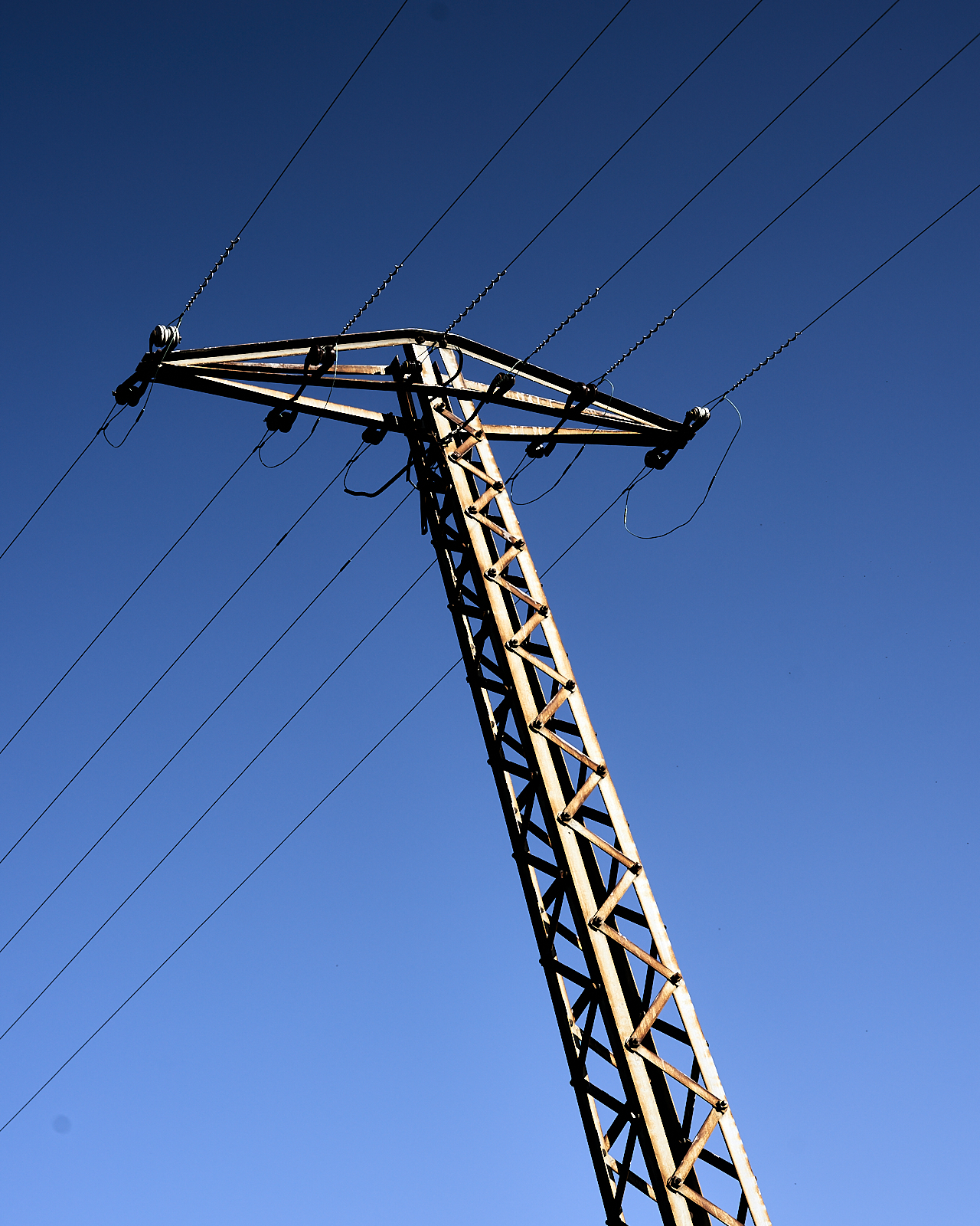 Urban #210917: A color photo of an old power pole.