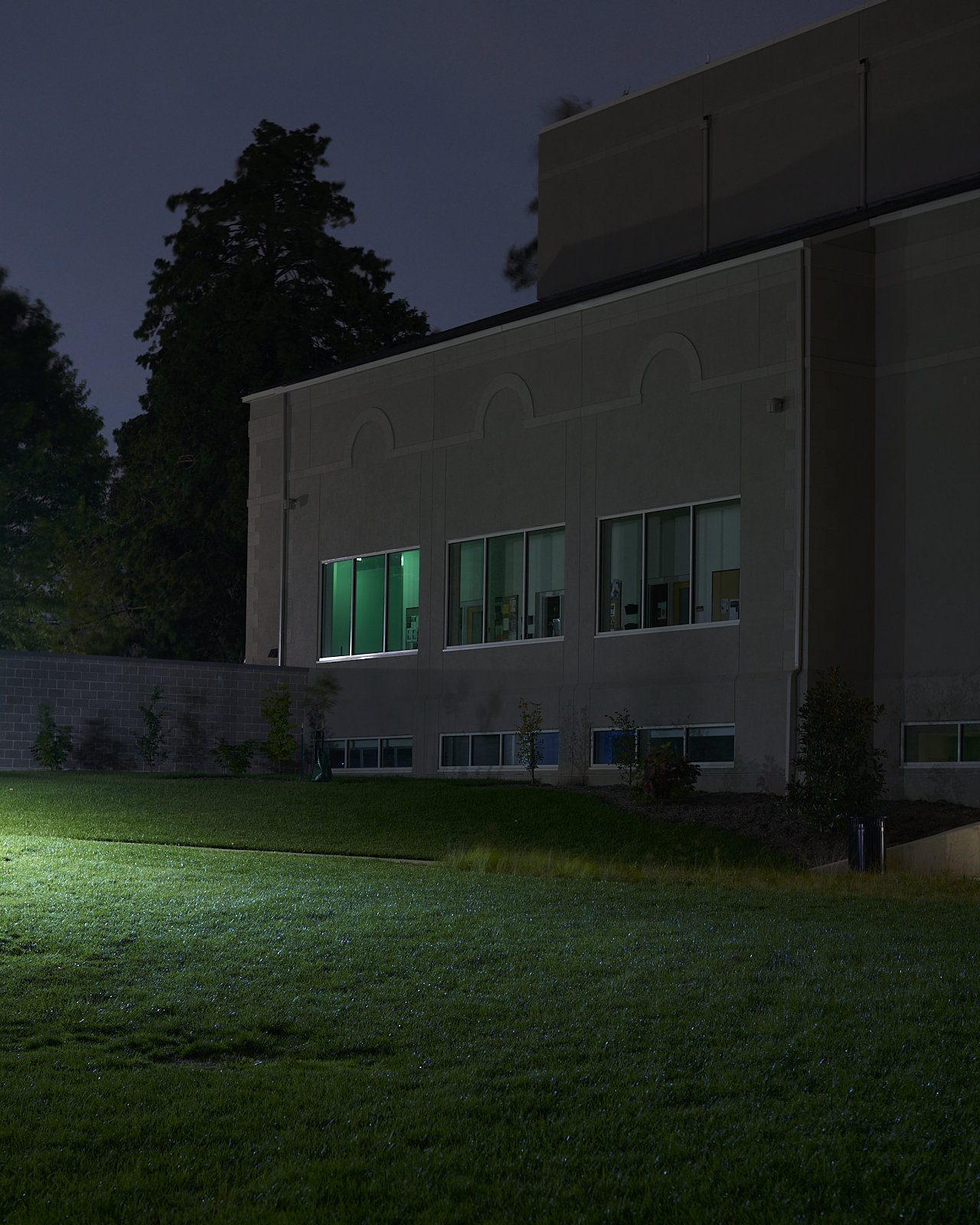 Urban #221007: A color photo of Haverford College music building after dark.