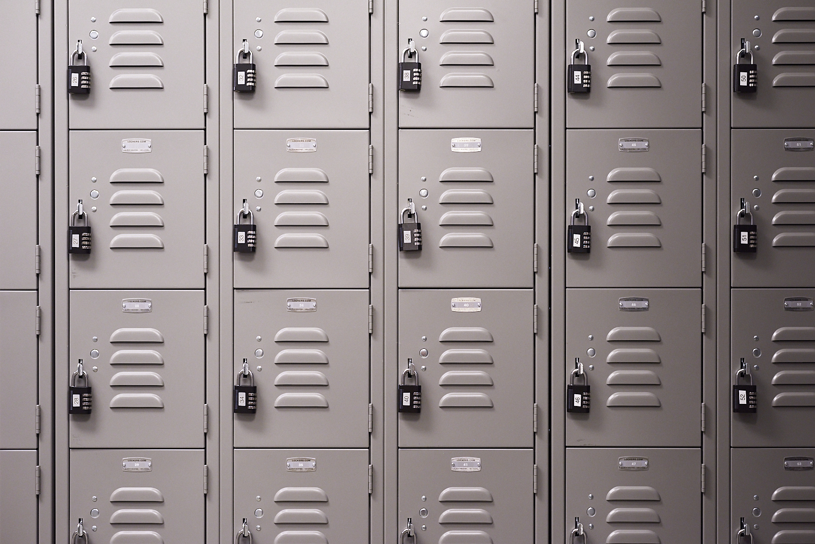 Interior #220226.1. A color photograph of lockers with locks hanging from the doors.