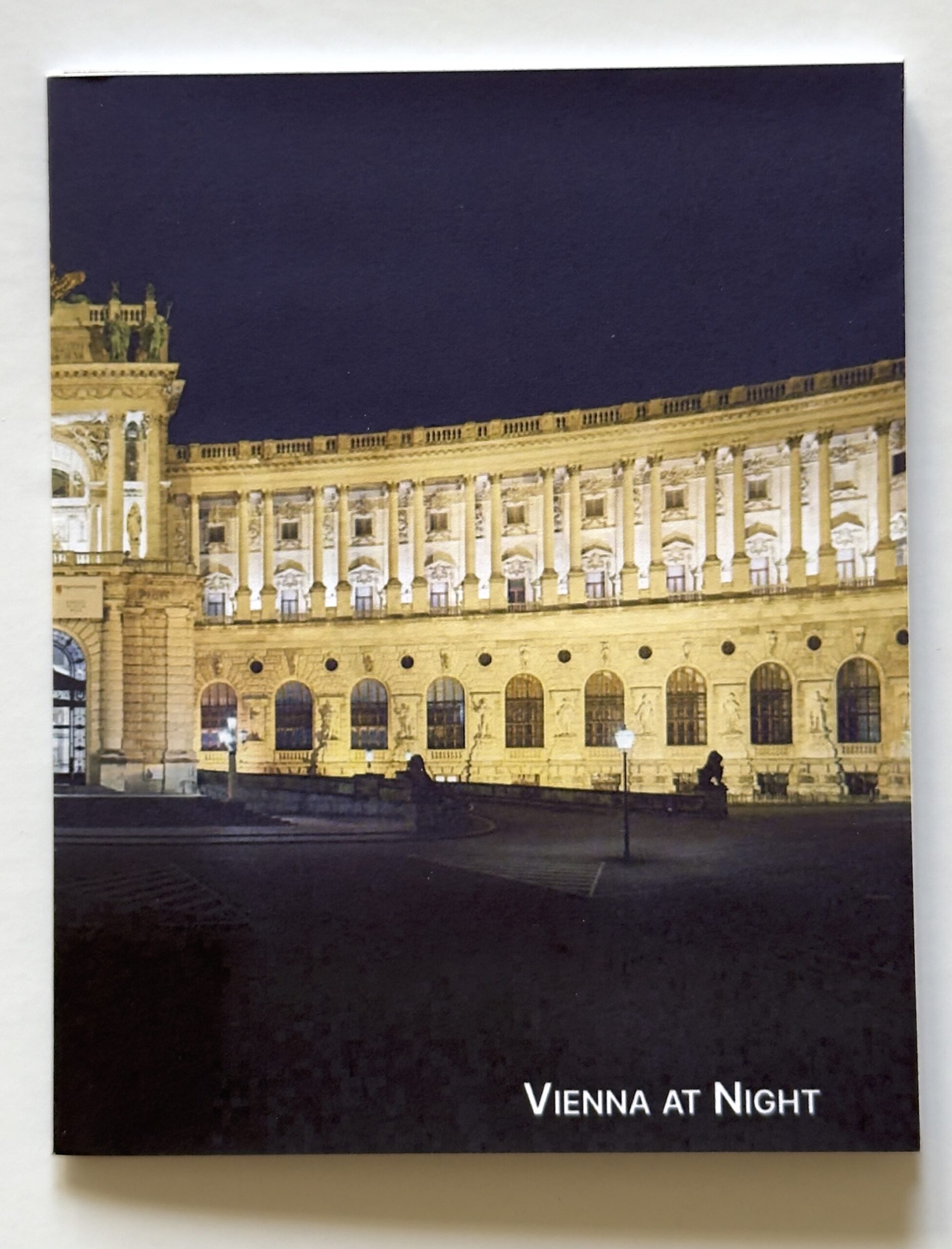 Color photograph of the cover of the “Vienna at Night” zine, showing half of the Hofburg.